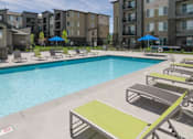 Thumbnail 19 of 36 - Outdoor Pool With Sunning Deck at Enclave at 1400 South Apartments, Salt Lake City, 84115