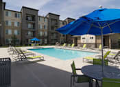 Thumbnail 21 of 36 - Poolside Dining  & Lounge Areas at Enclave at 1400 South Apartments, Utah