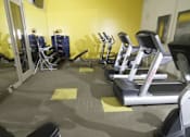 Thumbnail 23 of 36 - Cardio Machines In Gym at Enclave at 1400 South Apartments, Salt Lake City, UT, 84115