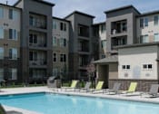 Thumbnail 28 of 36 - Relaxing Pool Area With Sundeck at Enclave at 1400 South Apartments, Utah, 84115