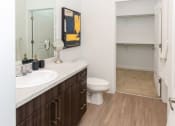Thumbnail 17 of 38 - Primary Bathroom with Large Closet at Garden Lofts Apartments, Utah, 84101