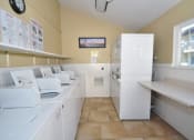 Thumbnail 11 of 18 - Community Laundry Center Heritage Park Senior Apartments - Norco CA