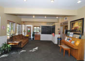 Thumbnail 16 of 18 - Heritage Park Senior Apartments Piano Lounge - Norco CA