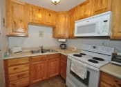 Thumbnail 3 of 18 - Modern Kitchen at Heritage Park Senior Apartments - Norco CA
