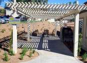 Thumbnail 9 of 15 - Peppertree Senior Apartments  Covered Patio - Near San Diego California