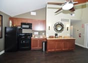 Thumbnail 12 of 15 - Peppertree Senior Apartments Community Kitchen  - Spring Valley, CA 91977