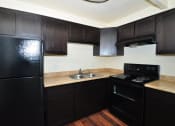 Thumbnail 4 of 15 - Updated Kitchen at Peppertree Senior Apartments  - Spring Valley, CA 91977