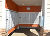 Thumbnail 12 of 17 - Community Mail Room at Village Grove Apartments, Escondido