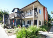Thumbnail 1 of 17 - Elegant Exterior View at Village Grove Apartments, Escondido
