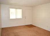 Thumbnail 5 of 17 - Living Room at Village Grove Apartments, Escondido, 92025