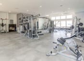 Thumbnail 48 of 61 - Cardio Workout Equipment in Fitness Center at Parc on 5th Apartments and Townhomes in American Fork Utah