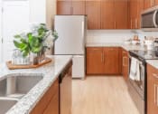 Thumbnail 27 of 61 - Gourmet Kitchen with Granite Countertops & Stainless Steel Appliances