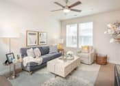 Thumbnail 30 of 61 - Large Living Area with Ceiling Fan at Parc on 5th Apartments and Townhomes