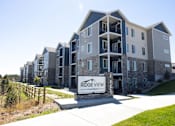 Thumbnail 1 of 34 - A large building with the name Ridge View on it.