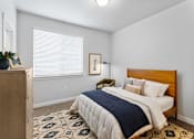Thumbnail 19 of 56 - Comfy Bedroom with Natural Lighting in Phase I TH at Parc at Day Dairy
