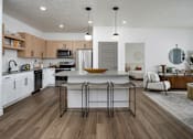 Thumbnail 7 of 40 - Parc Ridge Kitchen with Island and Energy Efficient Appliances