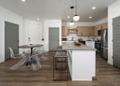 Thumbnail 6 of 40 - Parc Ridge Open  Kitchen and Dining Area