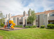 Thumbnail 18 of 21 - Outdoor Space with Playground at Chesapeake Commons Apartments, Rancho Cordova