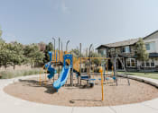 Thumbnail 7 of 61 - Outdoor Playground at Parc at Day Dairy Apartments and Townhomes, Utah