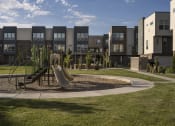 Thumbnail 38 of 41 - Playground in Courtyard at Parc View Apartments and Townhomes Midvale, UT 84047