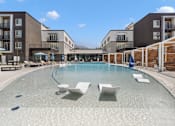 Thumbnail 23 of 48 - Pool Furniture at The Arza Apartments