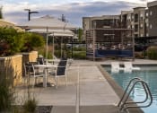 Thumbnail 22 of 41 - Poolside Lounge Furniture at Parc View Apartments and Townhomes Midvale, UT 84047