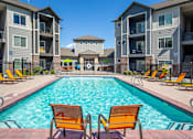 Thumbnail 15 of 33 - Poolside Relaxing Area at Four Seasons at Southtowne Apartments, South Jordan, UT
