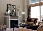 Thumbnail 25 of 40 - Living Room With Fireplace at Metropolitan Collection Apartments, Washington