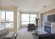 Thumbnail 12 of 25 - Studio Apartment Living Space at Revo 225 Apartments, Washington