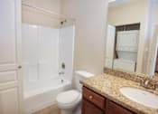 Thumbnail 17 of 25 - Bathroom with Granite Countertops at Revo 225 Apartments, Renton, WA, 98057