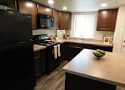 Thumbnail 3 of 20 - Updated Kitchen with Island at River Oaks