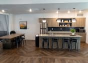 Thumbnail 21 of 23 - Seating at Kitchen in Clubhouse at Ridge View Apartments