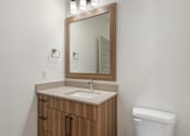 Thumbnail 26 of 28 - Sink and Mirror in Bathroom at Amara Apartments,Midvale