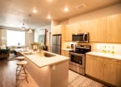 Thumbnail 3 of 44 - Gourmet Kitchen With Island at Soleil Lofts Apartments, Utah