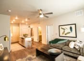 Thumbnail 5 of 44 - Living Room With Kitchen View at Soleil Lofts Apartments, Herriman, Utah
