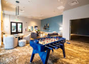 Thumbnail 34 of 44 - Game Room With Shuffle Board at Soleil Lofts Apartments, Utah, 84096