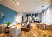 Thumbnail 33 of 44 - Clubroom With Smart TV And Ample Sitting Area at Soleil Lofts Apartments, Herriman, UT, 84096