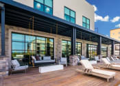 Thumbnail 1 of 44 - Lounging By The Pool at Soleil Lofts Apartments, Herriman, UT