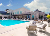 Thumbnail 28 of 44 - Pool With Sunning Deck at Soleil Lofts Apartments, Herriman, UT, 84096