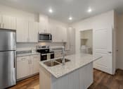 Thumbnail 1 of 18 - Spacious Kitchen at Magnolia at Homestead