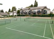 Thumbnail 23 of 42 - Tennis Court at Canyon Club Apartments