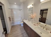 Thumbnail 13 of 52 - The Ash Apartments & Townhomes Bathroom with Walk In Closet