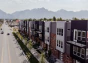 Thumbnail 33 of 37 - Outside View with Mountains in Background of The Hudson Townhomes Salt Lake City Utah 84106