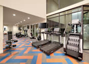 Thumbnail 22 of 53 - The Stack - Sugarhouse Apartments Gym Treadmills