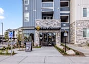 Thumbnail 50 of 54 - The entrance to a building with a sign that reads "1111 Foundry".