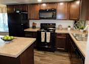 Thumbnail 4 of 20 - Fully Equipped Kitchen at River Oaks