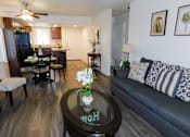 Thumbnail 6 of 20 - Living Room Open to Dining Area and Kitchen at River Oaks