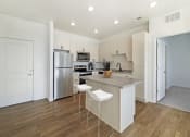 Thumbnail 11 of 14 - Kitchen in Two Bedroom Apartment at City Lofts