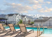 Thumbnail 35 of 39 - Poolside Lounge Area at Rivulet Apartments, American Fork, UT, 84003