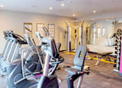 Thumbnail 10 of 16 - Fully Equipped Gym with Treadmills & Stationary Bikes at Kimpton Square Senior Apartments